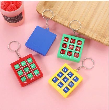 3 piezas nuevas Mini XO Tic-tac-toe llavero de escuela primaria juego de mesa de plástico Sanko Toy Venta de juegos para enviar regalos de cumpleaños